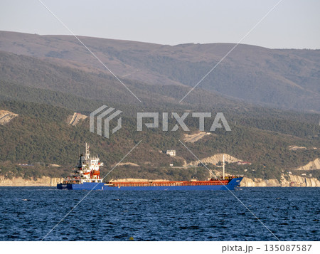 August 22 2025 Cargo ship Ege Bey sailing near Novorossiysk Russia on the Black Sea. Large commercial vessel moving along the coastline August 22 2025 Cargo ship Ege Bey sailing near Novorossiysk Russia on the Black Sea. Large commercial vessel moving along the coastline 135087587