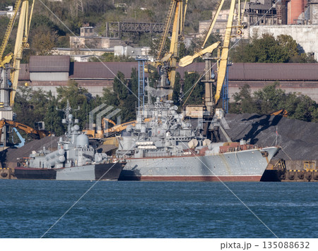 August 22 2025 View of Novorossiysk port Russia with cargo ships and cranes on the coastline. Industrial maritime scene on the Black Sea 135088632
