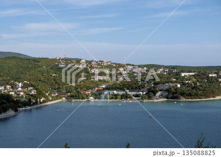 August 19, 2025 The promenade along Lake Abrau-Dyurso with calm water, greenery, and scenic surroundings 135088825