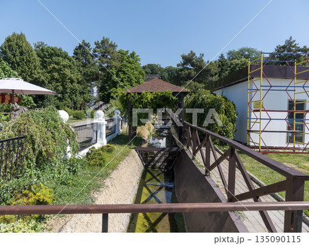 August 19, 2025 The promenade along Lake Abrau-Dyurso with calm water, greenery, and scenic surroundings 135090115