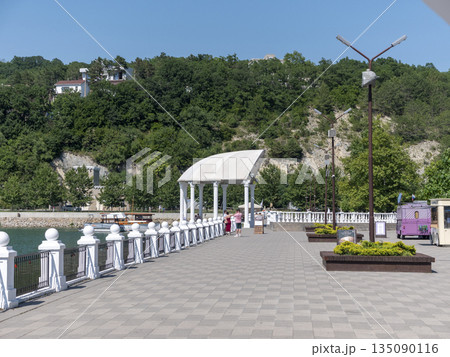 August 19, 2025 The promenade along Lake Abrau-Dyurso with calm water, greenery, and scenic surroundings 135090116