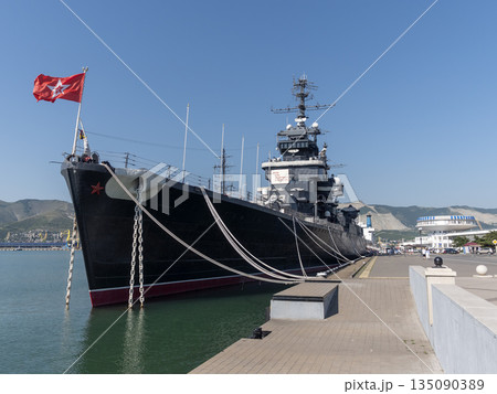 Novorossiysk Russia September 20 2025: The cruiser Mikhail Kutuzov moored in the city port. Historic Soviet Project 68bis museum ship Novorossiysk Russia September 20 2025: The cruiser Mikhail Kutuzov moored in the city port. Historic Soviet Project 68bis museum ship 135090389