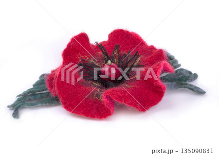 Brooch felted wool on a white background 135090831