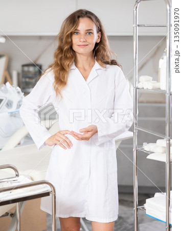 Young female doctor taking notes in medical room Young female doctor taking notes in medical room 135091970