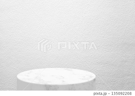 White Marble Product Display Stand on Concrete Wall Background. 135092208