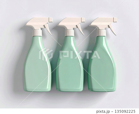 Product focused. Green sprays in a row on a white background. Disinfectant, glass cleaner, all-purpose surface cleaner. Mockup for branding cleaning product. 135092225