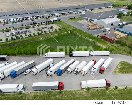 Truck parking at the logistics center. Aerial view. 135092385