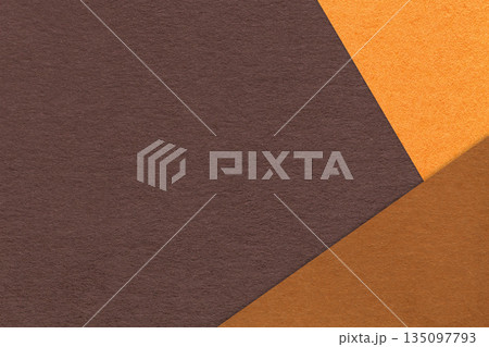 Abstract dark brown, orange and rust paper background with copy space. Template for presentation, banner, card design 135097793