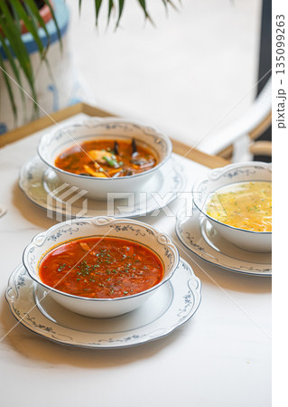 Three different soups served in restaurant table Three different soups served in restaurant table 135099263