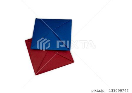 Paper ttakji projectiles. Traditional Korean game, variant of Ddakji chigi. Red and blue paper squares on white background for simple game. Popular game from South Korea Paper ttakji projectiles. Traditional Korean game, variant of Ddakji chigi. Red and blue paper squares on white background for simple game. Popular game from South Korea 135099745