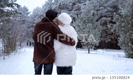 Lovers Stroll Through Winter Forest, Pair Of Individuals Enjoying Peaceful Winter Nature Walk, Romantic Partners Sharing Serene Moments Amidst Snowcovered Forest Landscape During Winter Season Lovers Stroll Through Winter Forest, Pair Of Individuals Enjoying Peaceful Winter Nature Walk, Romantic Partners Sharing Serene Moments Amidst Snowcovered Forest Landscape During Winter Season 135100824