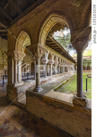 Romanesque cloister arches and columns in Moissac Abbey Romanesque cloister arches and columns in Moissac Abbey 135101039