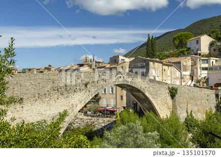 Nyons Roman bridge spanning Eygues river, Provence village 135101570