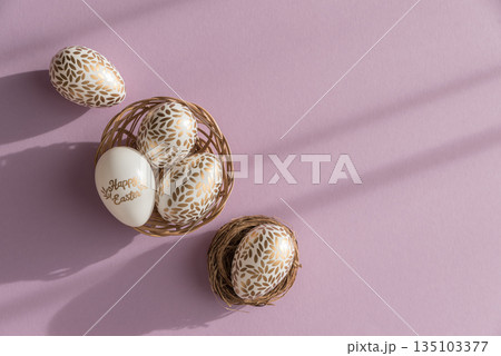 Pastel Easter Eggs with Gold Details and Flowers on Lavender Background 135103377
