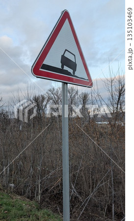 Image depicts safety indicator with aged surface and blurred background Image depicts safety indicator with aged surface and blurred background 135103469