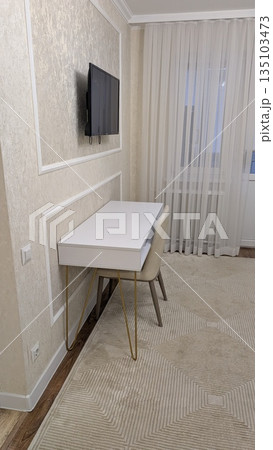 Compact area for remote work and relaxation purposes only Compact area for remote work and relaxation purposes only 135103473