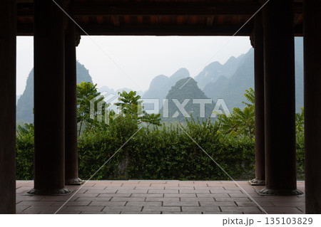 Framing breathtaking view of Ninh Binh mountains from Bich Dong Pagoda Framing breathtaking view of Ninh Binh mountains from Bich Dong Pagoda 135103829