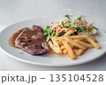 Close up of Grilled beef steak, boiled french fries and vegetable salad;Selective focus 135104528