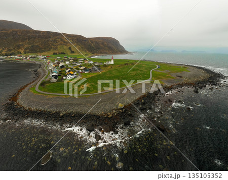 Panorama of Alesund, Norway, surrounded by the Norwegian Sea. Iconic coastal city with colorful buildings, fjords, and maritime landscape. Perfect for travel, architecture, and Nordic scenery concepts 135105352
