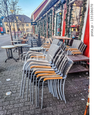 Stacked Chairs at a Closed Outdoor Cafe in Reykjavik Stacked Chairs at a Closed Outdoor Cafe in Reykjavik 135106070