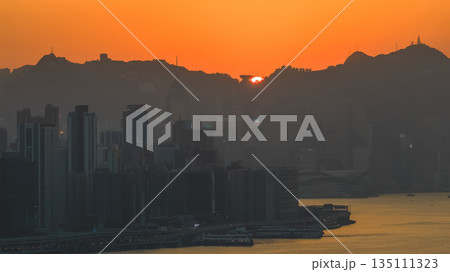 Jan 4 2026 Golden Sunset Over The Peak tower Hong Kong 135111323