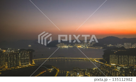 Tseung Kwan O Sunset Coastal Urban Landscape Hong Kong Jan 3 2026 Tseung Kwan O Sunset Coastal Urban Landscape Hong Kong Jan 3 2026 135112982