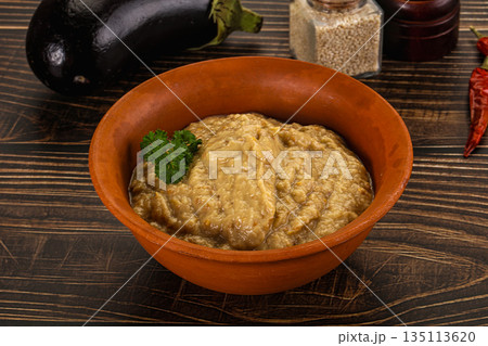 Eggplant dip - Mutabal with tahini paste Eggplant dip - Mutabal with tahini paste 135113620