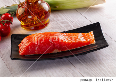 Salted salmon fish fillet piece 135113657