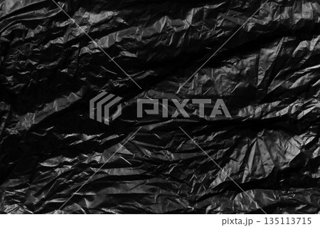 garbage bag is crumpled dark black garbage bag is crumpled dark black 135113715