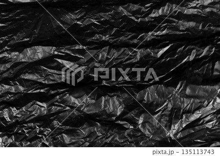 garbage bag is crumpled dark black garbage bag is crumpled dark black 135113743