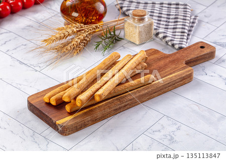 Baked Italian Grissini sticks heap Baked Italian Grissini sticks heap 135113847