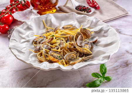 Italian pasta spaghetti with vongole Italian pasta spaghetti with vongole 135113865