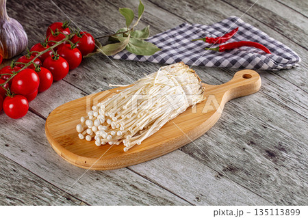Raw organic fresh enoki mushrooms Raw organic fresh enoki mushrooms 135113899
