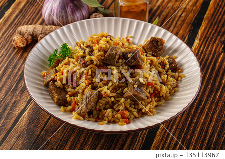 Asian traditional pilaf with beef 135113967