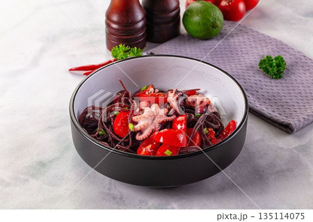 Gourmet black spaghetti with octopus 135114075