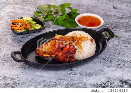 Spicy roasted chicken wing with rice 135114116