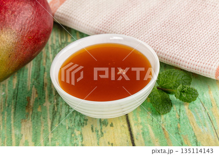 Sweet dessert orange mango puree Sweet dessert orange mango puree 135114143