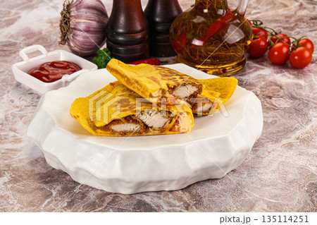 Spicy quesadillas with chicken fillet Spicy quesadillas with chicken fillet 135114251