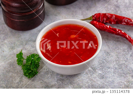 Asian sweet and sour chili sauce 135114378