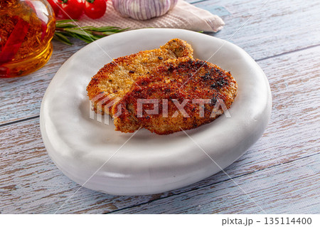 Breaded meat fillet escalope schnitzel Breaded meat fillet escalope schnitzel 135114400