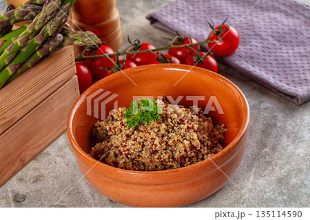 Boiled quinoa cereal in the bowl 135114590