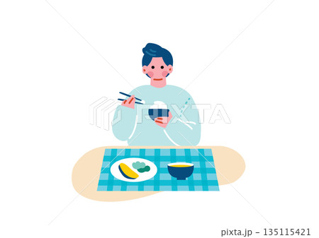 食事をする若い男性 135115421