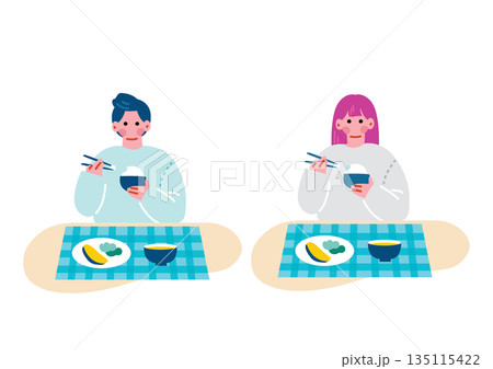 食事をする若い男女 135115422
