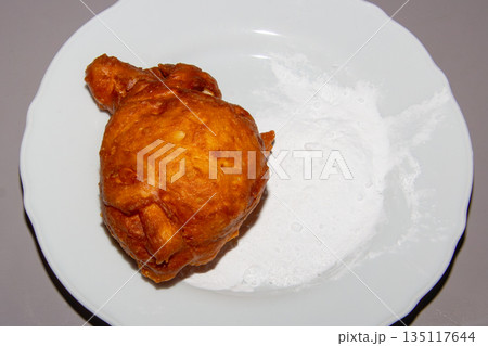 Frying doughnuts for new years eve 135117644