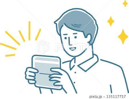 通帳を見て喜んでいる男性 135117757