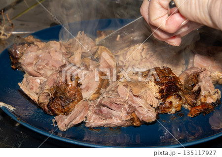 Preparing a stew with pork roll Preparing a stew with pork roll 135117927