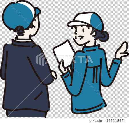 A woman wearing a hat and blue work clothes explaining to a visitor A woman wearing a hat and blue work clothes explaining to a visitor 135118574