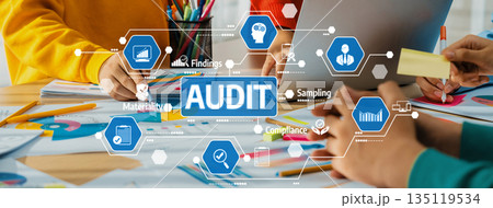 Hands-on collaboration for audit process showing charts, compliance measures, and findings in a vibrant office setting with digital elements for visual impact.. Amity 135119534