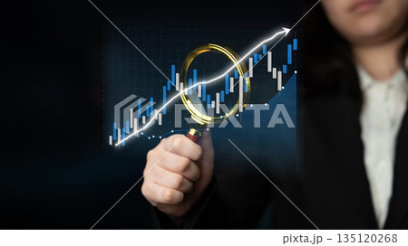 Businesswoman Holding Magnifying Glass Analyzing Rising Stock Market Trend with Candlestick Chart and Graph of Financial Data in Dark Background Impute Businesswoman Holding Magnifying Glass Analyzing Rising Stock Market Trend with Candlestick Chart and Graph of Financial Data in Dark Background Impute 135120268