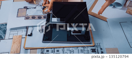 Detailed Architectural Model Design Process with Hands of Creators Working on Blueprints and Presentations for Modern House Project SACTR 135120794